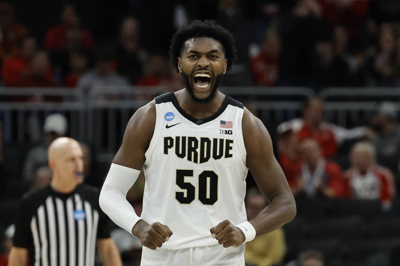 Purdue's Trevion Williams celebrates during the second half of a second-round NCAA college basketba...