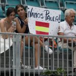 
              Fans hold a sign encouraging Paula Badosa, of Spain, as she plays Jessica Pegula, of the U.S., in a quarterfinal match at the Miami Open tennis tournament, Wednesday, March 30, 2022, in Miami Gardens, Fla. (AP Photo/Rebecca Blackwell)
            
