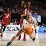
              Iowa State guard Emily Ryan, center, runs down a loose ball during the second half of a second-round game against Georgia in the NCAA women's college basketball tournament, Sunday, March 20, 2022, in Ames, Iowa. (AP Photo/Charlie Neibergall)
            