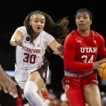 
              Utah forward Dasia Young (34) dribbles up the court followed by Stanford guard Haley Jones (30) during the first half of the NCAA Pac-12 basketball tournament championship game, Sunday, March 6, 2022, in Las Vegas. (AP Photo/Ellen Schmidt)
            