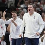 
              Arizona head coach Tommy Lloyd yells during the first half of a college basketball game against Houston in the Sweet 16 round of the NCAA tournament on Thursday, March 24, 2022, in San Antonio. (AP Photo/David J. Phillip)
            