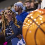 
              People react as they attend an on-campus watch party at Saint Peter's during the NCAA men's college basketball tournament game between Saint Peter's and North Carolina, Sunday, March 27, 2022, in Jersey City, N.J. (AP Photo/Eduardo Munoz Alvarez)
            