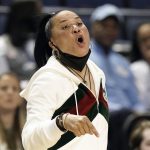 
              South Carolina head coach Dawn Staley directs her players during the first half of a college basketball game against North Carolina in the Sweet 16 round of the NCAA tournament in in Greensboro, N.C., Friday, March 25, 2022. (AP Photo/Gerry Broome)
            