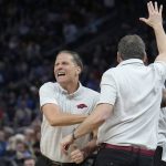 
              Arkansas head coach Eric Musselman, left, celebrates during the second half of a college basketball game against Gonzaga in the Sweet 16 round of the NCAA tournament in San Francisco, Thursday, March 24, 2022. (AP Photo/Tony Avelar)
            