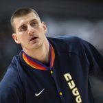 
              Denver Nuggets center Nikola Jokic warms up for the team's NBA basketball game against the Los Angeles Clippers on Tuesday, March 22, 2022, in Denver. (AP Photo/David Zalubowski)
            