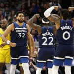 
              Minnesota Timberwolves center Karl-Anthony Towns (32) celebrates with Patrick Beverley (22) and D'Angelo Russell (0) during the second half of the team's NBA basketball game against the Los Angeles Lakers on Wednesday, March 16, 2022, in Minneapolis. (AP Photo/Andy Clayton-King)
            