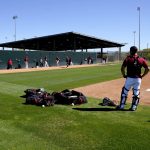 
              Arizona Diamondbacks' players workout during the first day of baseball spring training, Friday, March 11, 2022, in Scottsdale, Ariz. (AP Photo/Matt York)
            