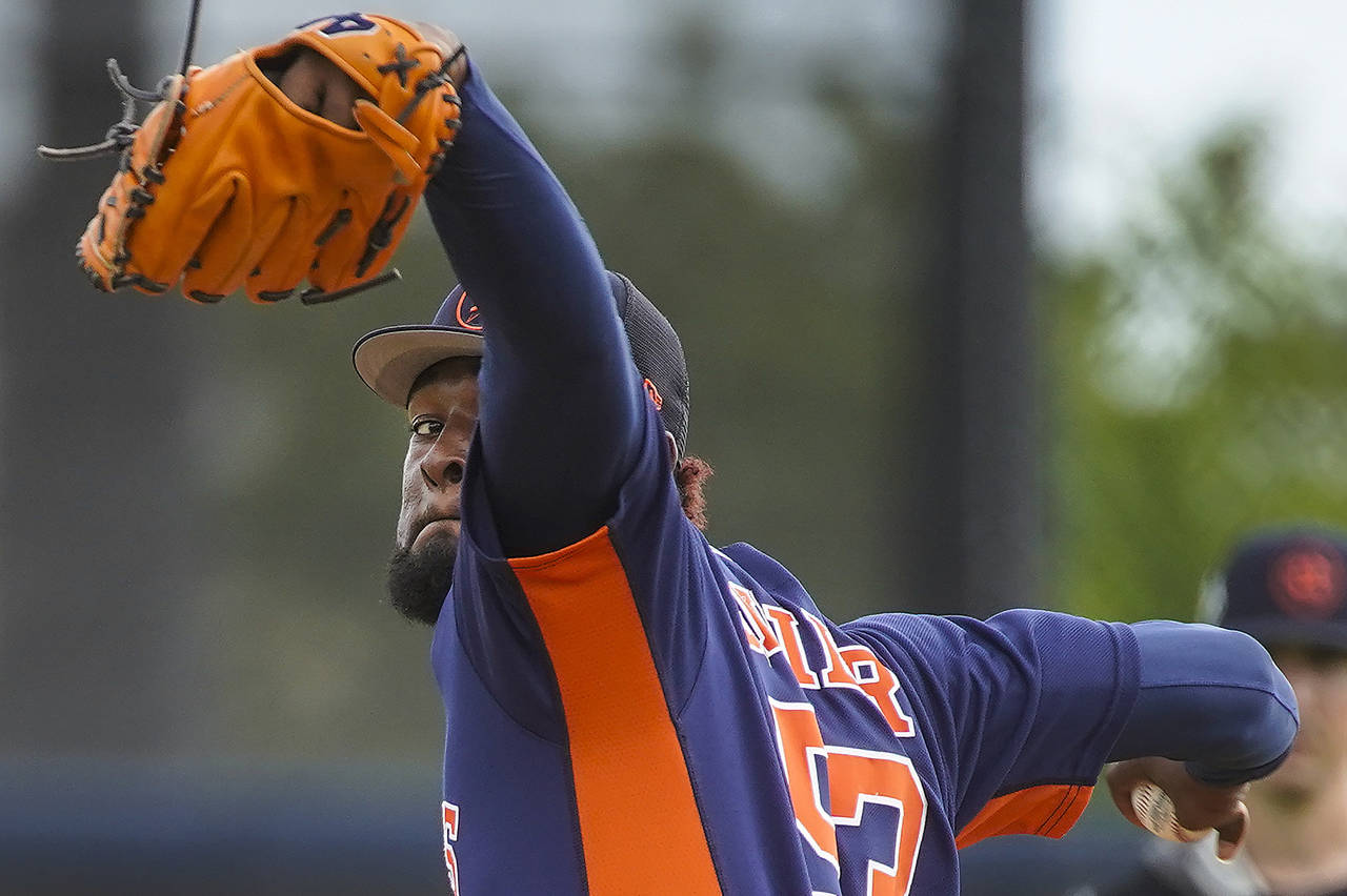 Houston Astros pitcher Christian Javier (53) throws live batting practice during spring training ba...