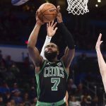 
              Boston Celtics guard Jaylen Brown goes up to shoot in the second half of an NBA basketball game against the Oklahoma City Thunder, Monday, March 21, 2022, in Oklahoma City. (AP Photo/Kyle Phillips)
            