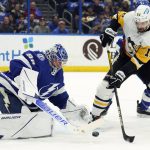 
              Tampa Bay Lightning goaltender Andrei Vasilevskiy (88) makes a save on a shot by Pittsburgh Penguins left wing Zach Aston-Reese (12) during the first period of an NHL hockey game Thursday, March 3, 2022, in Tampa, Fla. (AP Photo/Chris O'Meara)
            