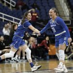 
              Creighton guard Lauren Jensen (15) and guard Molly Mogensen (21) react during the second half of the team's college basketball game against Iowa State in the Sweet 16 round of the NCAA women's tournament in Greensboro, N.C., Friday, March 25, 2022. (AP Photo/Gerry Broome)
            