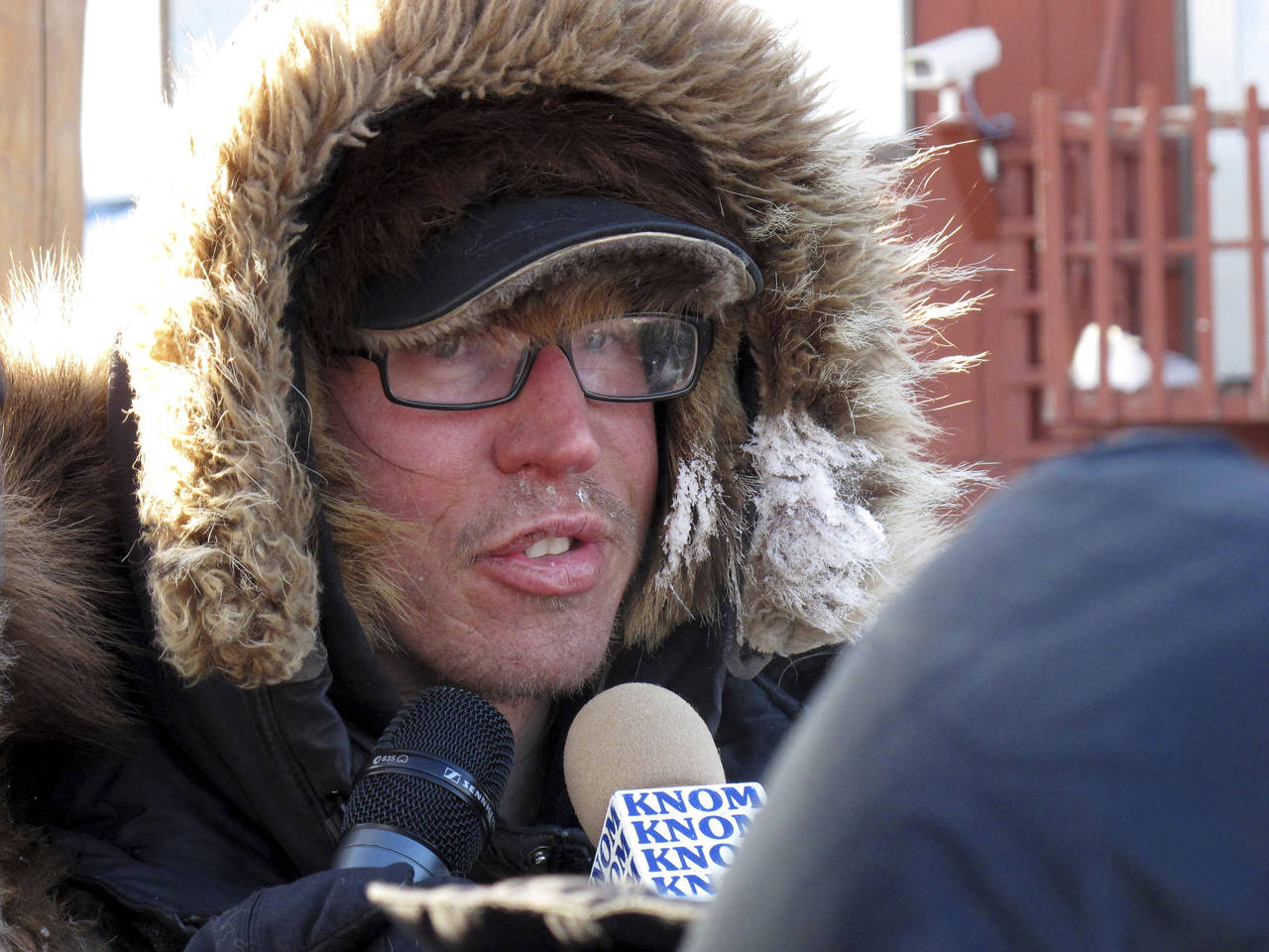 FILE - Musher Brent Sass speaks to reporters after completing the nearly 1,000 mile Iditarod Trail ...