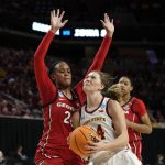 
              Iowa State guard Ashley Joens, right, drives to the basket past Georgia forward Jordan Isaacs, left, during the second half of a second-round game in the NCAA women's college basketball tournament, Sunday, March 20, 2022, in Ames, Iowa. (AP Photo/Charlie Neibergall)
            