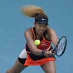 
              Naomi Osaka of Japan lunges for a ball in her second round women's match against Angelique Kerber of Germany at the Miami Open tennis tournament, Thursday, March 24, 2022, in Miami Gardens, Fla. (AP Photo/Rebecca Blackwell)
            