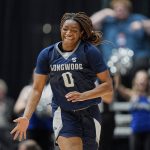 
              Longwood forward Brooke Anya (0) celebrates after a basket during an NCAA college basketball game against Campbell for the championship of the Big South Conference tournament Sunday, March 6, 2022, in Charlotte, N.C. (AP Photo/Rusty Jones)
            