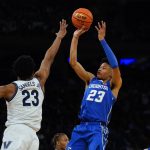 
              Creighton's Trey Alexander, front right, shoots over Villanova's Jermaine Samuels, left, during the second half of an NCAA college basketball game in the final of the Big East conference tournament Saturday, March 12, 2022, in New York. (AP Photo/Frank Franklin II)
            