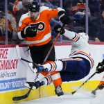 
              Philadelphia Flyers' Rasmus Ristolainen, left, collides with Edmonton Oilers' Devin Shore during the third period of an NHL hockey game, Tuesday, March 1, 2022, in Philadelphia. (AP Photo/Matt Slocum)
            