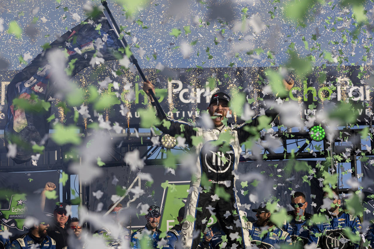 Ross Chastain celebrates after winning a NASCAR Cup Series auto race at Circuit of the Americas, Su...