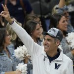 
              Villanova head coach Jay Wright leaves the court after their win against Houston during a college basketball game in the Elite Eight round of the NCAA tournament on Saturday, March 26, 2022, in San Antonio. (AP Photo/Eric Gay)
            