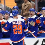
              New York Islanders' Brock Nelson (29) celebrates with teammates after scoring a goal during the second period of an NHL hockey game against the St. Louis Blues, Saturday, March 5, 2022, in Elmont, N.Y. (AP Photo/Frank Franklin II)
            