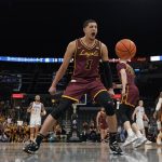 
              Loyola of Chicago's Lucas Williamson (1) celebrates during the first half of an NCAA college basketball game against Drake in the championship of the Missouri Valley Conference tournament Sunday, March 6, 2022, in St. Louis. (AP Photo/Jeff Roberson)
            