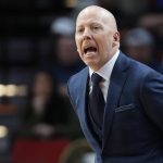 
              UCLA head coach Mick Cronin calls to his team during the first half of a first-round NCAA college basketball tournament game against Akron, Thursday, March 17, 2022, in Portland, Ore. (AP Photo/Craig Mitchelldyer)
            