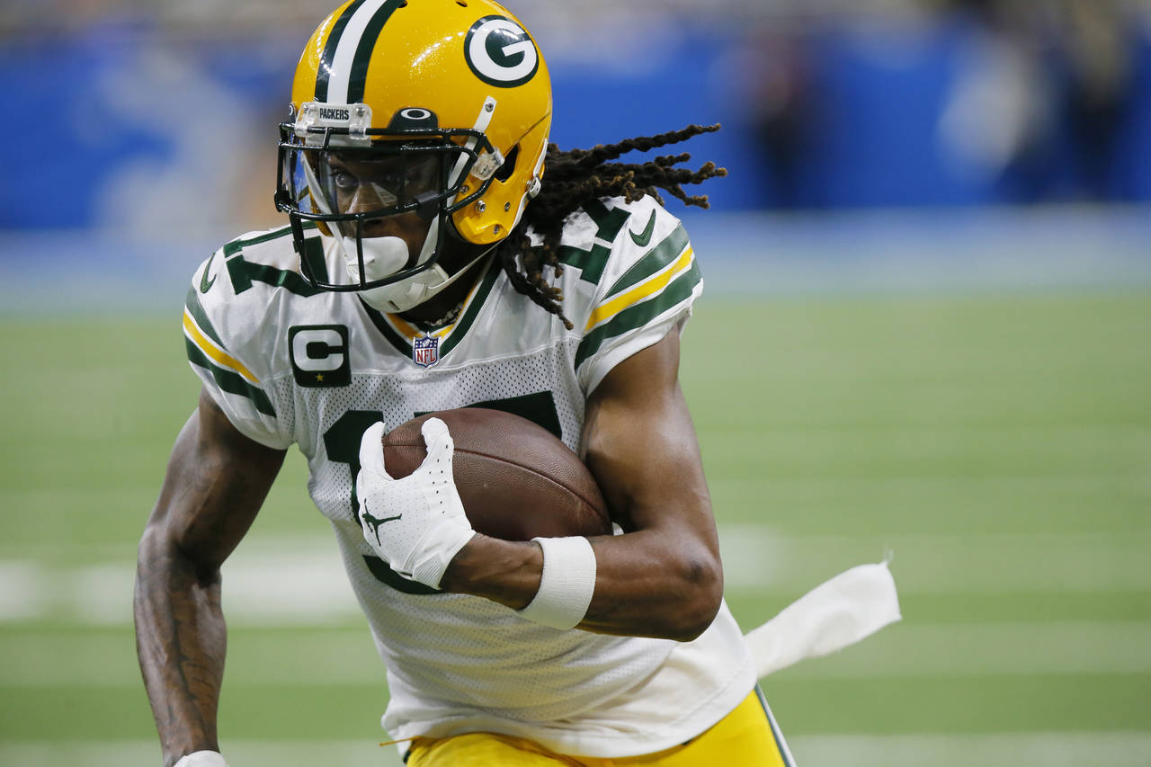 FILE - Green Bay Packers wide receiver Davante Adams runs during the first half of the team's NFL f...