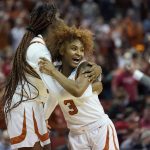 
              Texas forward Latasha Lattimore, left, and teammate Rori Harmon (3) celebrate their win over Utah in a college basketball game in the second round of the NCAA women's tournament, Sunday, March 20, 2022, in Austin, Texas. (AP Photo/Eric Gay)
            