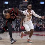 
              Toronto Raptors forward Pascal Siakam (43) drives past Cleveland Cavaliers guard Tim Frazier (10) during the first half of an NBA basketball game Thursday, March 24, 2022, in Toronto. (Nathan Denette/The Canadian Press via AP)
            