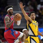 
              Detroit Pistons forward Saddiq Bey (41) looks to pass as Indiana Pacers guard Malcolm Brogdon (7) defends in the second half of an NBA basketball game in Detroit, Friday, March 4, 2022. (AP Photo/Paul Sancya)
            