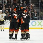 
              Anaheim Ducks center Trevor Zegras (46) celebrates with teammates after scoring a goal during the third period of an NHL hockey game against the Boston Bruins in Anaheim, Calif., Tuesday, March 1, 2022. The Ducks won 4-3. (AP Photo/Ashley Landis)
            