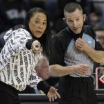 
              South Carolina head coach Dawn Staley speaks with an official during the first half of a college basketball game against Creighton in the Elite 8 round of the NCAA tournament in Greensboro, N.C., Sunday, March 27, 2022. (AP Photo/Gerry Broome)
            