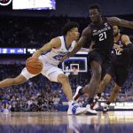 
              Creighton's Trey Alexander (23) drives against Connecticut's Adama Sanogo (21) during the first half of an NCAA college basketball game Wednesday, March 2, 2022, in Omaha, Neb. (AP Photo/Rebecca S. Gratz)
            