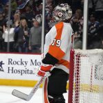 
              Philadelphia Flyers goaltender Carter Hart reacts after giving up a goal to Colorado Avalanche center Nazem Kadri in the first period of an NHL hockey game Friday, March 25, 2022, in Denver. (AP Photo/David Zalubowski)
            