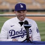 
              Los Angeles Dodgers' Freddie Freeman speaks during an introductory news conference at spring training baseball, Friday, March 18, 2022, in Glendale, Ariz. (AP Photo/Charlie Riedel)
            