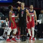 
              Los Angeles Clippers guard Luke Kennard (5) reacts after shooting a 3-pointer during the second half of an NBA basketball game against the Washington Wizards in Los Angeles, Wednesday, March 9, 2022. (AP Photo/Ashley Landis)
            