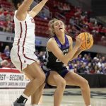
              Kansas State's Emilee Ebert, right, looks to shoot as Washington State's Ula Motuga, left, defends during the first half of a college basketball game in the first round of the NCAA tournament in Raleigh, N.C., Saturday, March 19, 2022. (AP Photo/Ben McKeown)
            