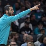 
              Charlotte Hornets coach James Borrego points during the first half of the team's NBA basketball gam against the Utah Jazz, Friday, March 25, 2022, in Charlotte, N.C. (AP Photo/Matt Kelley)
            