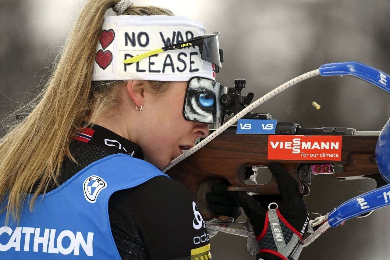 Ingrid Landmark Tandrevold of Norway sports a headband reading No War Please as she competes in the...