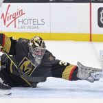 
              Vegas Golden Knights goaltender Logan Thompson (36) makes a save against the Nashville Predators during the first period of an NHL hockey game Thursday, March 24, 2022, in Las Vegas. (AP Photo/David Becker)
            