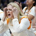 
              Tennessee head coach Kellie Harper watches the action in the first half of an NCAA college basketball semifinal round game against Kentucky at the women's Southeastern Conference tournament Saturday, March 5, 2022, in Nashville, Tenn. (AP Photo/Mark Humphrey)
            