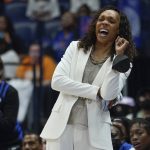 
              Kentucky head coach Kyra Elzy watches the action in the first half of the NCAA women's college basketball Southeastern Conference tournament championship game against South Carolina Sunday, March 6, 2022, in Nashville, Tenn. (AP Photo/Mark Humphrey)
            