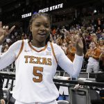 
              Texas forward DeYona Gaston (5) reacts after a college basketball game against Ohio State in the Sweet 16 round of the NCAA tournament, Friday, March 25, 2022, in Spokane, Wash. Texas won 66-63. (AP Photo/Young Kwak)
            