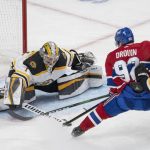 
              Boston Bruins goaltender Jeremy Swayman (1) stops Montreal Canadiens' Jonathan Drouin (92) during the third period of an NHL hockey game in Montreal, Monday, March 21, 2022. (Ryan Remiorz/The Canadian Press via AP)
            