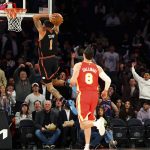 
              New York Knicks forward Obi Toppin (1) dunks against the Atlanta Hawks during the first half of an NBA basketball game, Tuesday, March 22, 2022, in New York. (AP Photo/Jessie Alcheh)
            