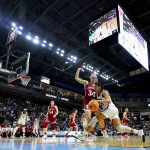 
              Connecticut guard Azzi Fudd (35) drives against Indiana guard Grace Berger (34) during the first quarter of a college basketball game in the Sweet Sixteen round of the NCAA women's tournament, Saturday, March 26, 2022, in Bridgeport, Conn. (AP Photo/Frank Franklin II)
            