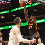 
              Atlanta Hawks forward Onyeka Okongwu (17) dunks during the second half of an NBA basketball game against the Los Angeles Clippers, Friday, March 11, 2022, in Atlanta. (AP Photo/Hakim Wright Sr.)
            