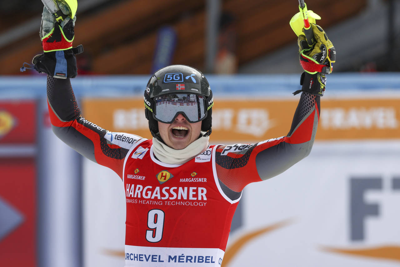 Norway's Atle Lie McGrath celebrates winning an alpine ski, men's World Cup slalom, in Meribel, Fra...