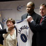 
              FILE- Antawn Jamison, second from right, holds his new Washington Wizards jersey as he poses with Wizards coach Eddie Jordan, left, president Susan O'Malley, second left, and president of basketball operations Ernie Grunfeld, right, during a news conference, June 28, 2004, in Washington. Jamison was acquired by the Wizards from the Dallas Mavericks in exchange for Jerry Stackhouse, Christian Laettner and the Mavericks' fifth pick in last week's draft, Wisconsin point guard Devin Harris. (AP Photo/Manuel Balce Ceneta, File)
            
