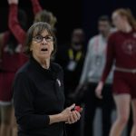 
              Stanford head coach Tara VanDerveer watches during a practice session for a college basketball game in the semifinal round of the Women's Final Four NCAA tournament Thursday, March 31, 2022, in Minneapolis. (AP Photo/Eric Gay)
            